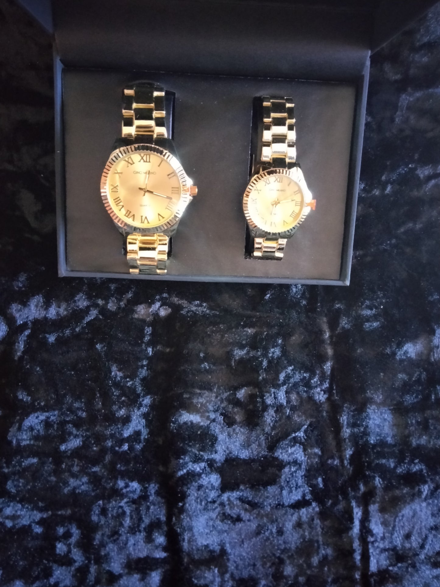 matching men and women watch set.